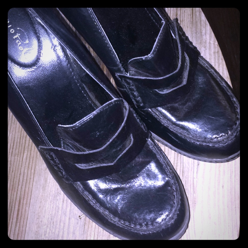 Black 8 1/2 heeled penny loafers